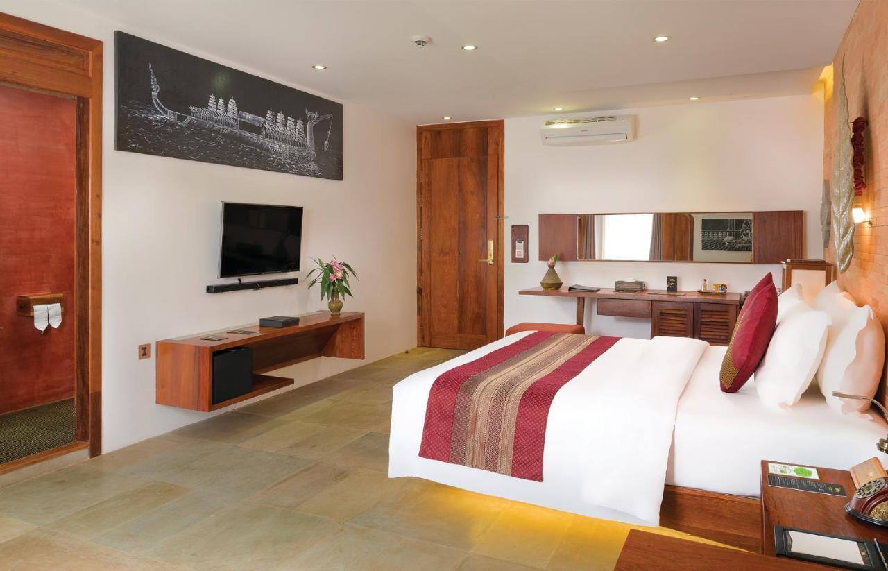 فندق جولدن تيمبل ريزيدانس سيام ريب المظهر الخارجي الصورة A bedroom at the Taj Bengal