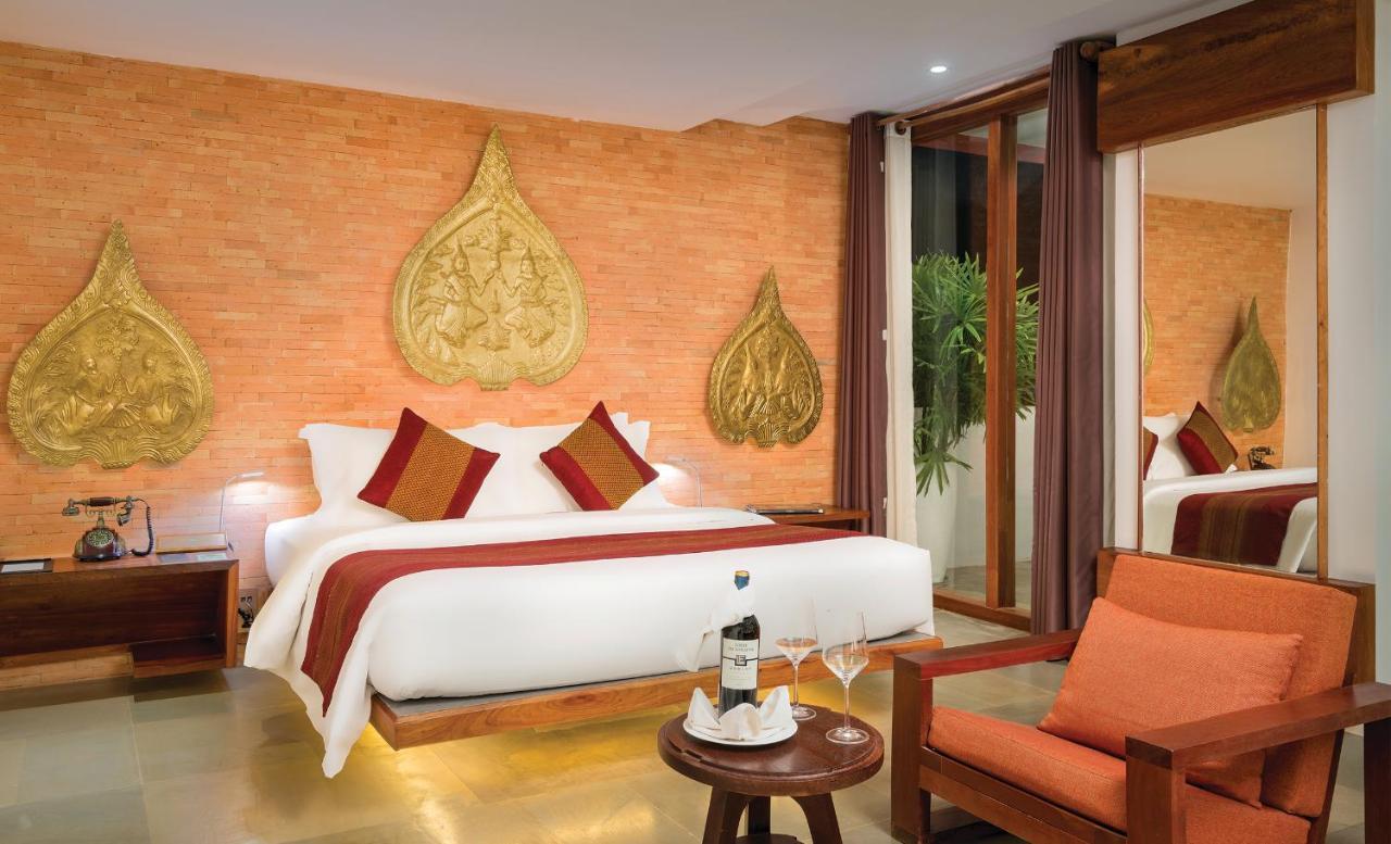 فندق جولدن تيمبل ريزيدانس سيام ريب المظهر الخارجي الصورة A bedroom at the hotel